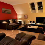 Seepanorama Wohnzimmer abends